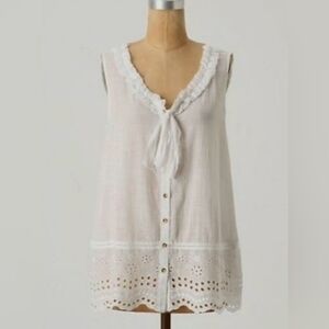 White long blouse with floral detailing and fringe